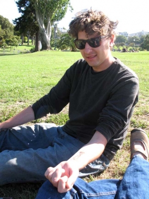 YellowBear shows off his SFØ bodyart.