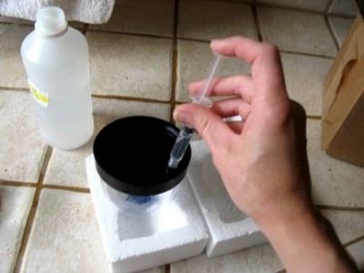 Inserting rubbing alcohol. Inserting rubbing alcohol.