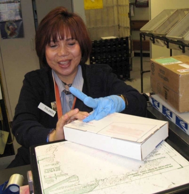Yolanda helping me mail it.