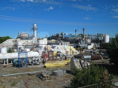 Really neato recycling plant with bails of plastic bags.