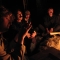 Tensions easing at the bonfire.