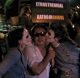 Frank Chu sandwitch with Lara Black.