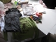Stenciled shirts and sign-making materials.