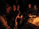 Tensions easing at the bonfire.