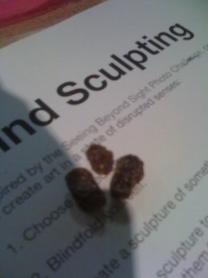 raisin under blind hands