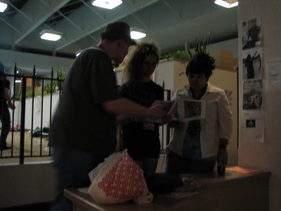 explaining the game to passersby explaining the game to passersby