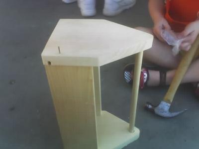 Adult starts the other side and turns over the box