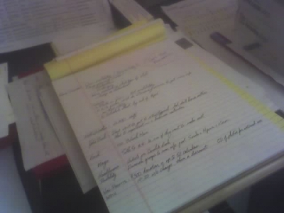 The notebook on Forrest's desk.