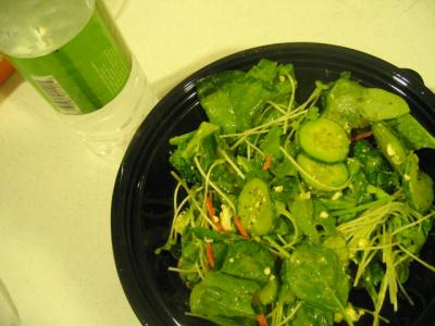 Salad with sprouts, cucumbers, green herby vinaigrette 