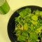 Salad with sprouts, cucumbers, green herby vinaigrette 