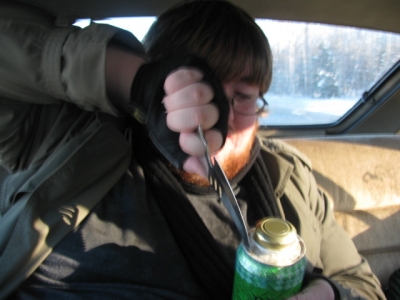 Jon opening the can with a knife