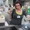 the awesome cashier strikes a pose
