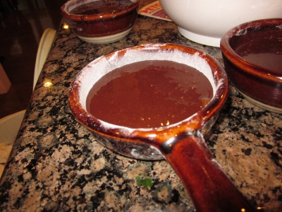 moving steadily toward the oven. 