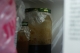 A jar of mysterious brown liquid