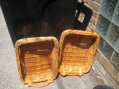 two very nice woven serving tray basket things