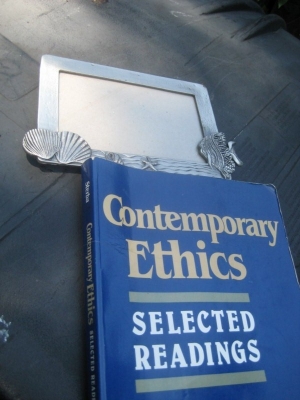 contemporary ethics and a silver fish mirror thing