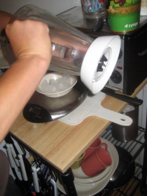 weighing small snowcone 