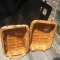 two very nice woven serving tray basket things