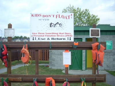 The Kids don't Float sign with the info posted on the right.