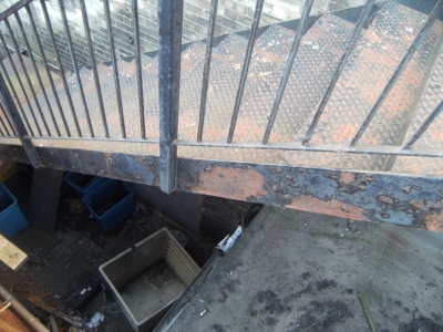 Stairs down to lower roof.