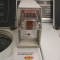 Behold the coin-operated washer.