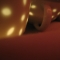 candles in tea cups on skin