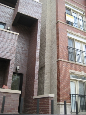 New buildings use gray cinderblocks in place of back brick