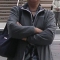 my mom, with her odd-looking parrot on her shoulder
