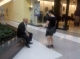 Her triumph is short lived--shirt&tie guy denies her a high-five.