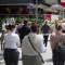 Lights change, cars move, people walk