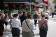Lights change, cars move, people walk