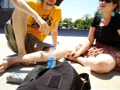 Two refined elegant pizza eaters.