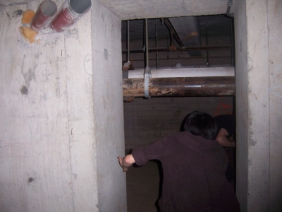 My friends crawling through a doorway