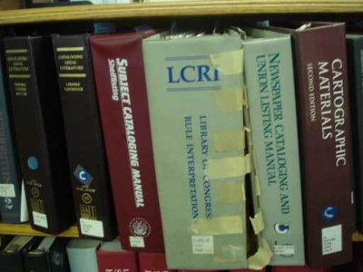 more cataloging books, some quite abused