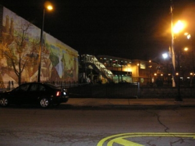 Western stop from side, and mural