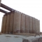 The smaller group of grain storage tubes. Probably about 150 feet tall.