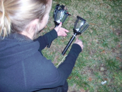 Little Albatross tying two more broken lights together.