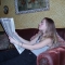 Reading the newspaper.