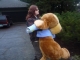 Miss Woof carries Mr. Woofums