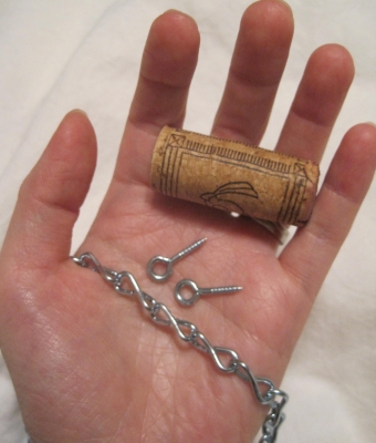 Two boxes of eye screws and half a foot of light chain