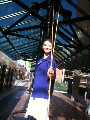 Pixie standing on the swing