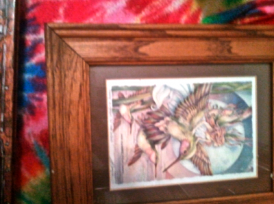 A picture of a fairy on a bird 