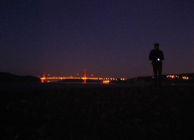 Rubin standing in the labyrinth in front of the Golden Gate Bridge