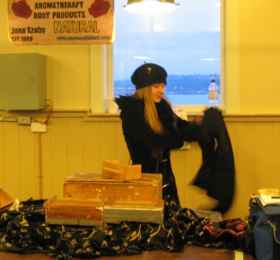 cleaning her stand at the market