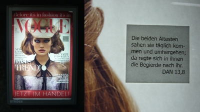 On a Vogue ad in the Stacchus train station. On a Vogue ad in the Stacchus train station.