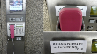 Underneath the earpiece of a phone booth in Munich central station. Underneath the earpiece of a phone booth in Munich central station.