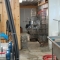 Milk crates, a motorbike, and cleaning