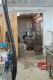 Milk crates, a motorbike, and cleaning