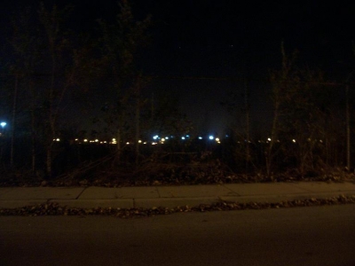 autumn field and city lights