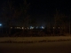 autumn field and city lights